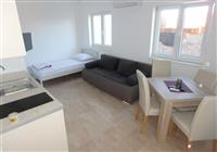 Apartmány Kolombo - dvoulůžková ložnice, oddělená místnost s kuchyňským  koutem - typ Apt. 3+1 I. patro - 3